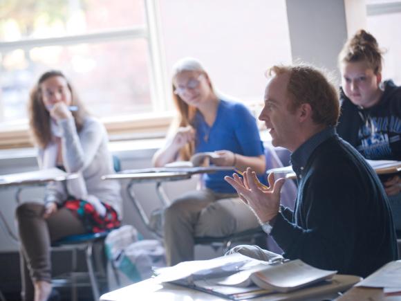 Professor George Layng talking to class