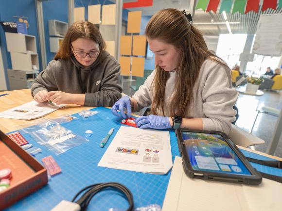 Students working on a project in a criminal justice forensics course.