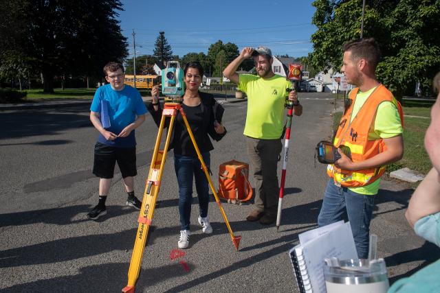 GARP class featuring instructor with students using surveying tools