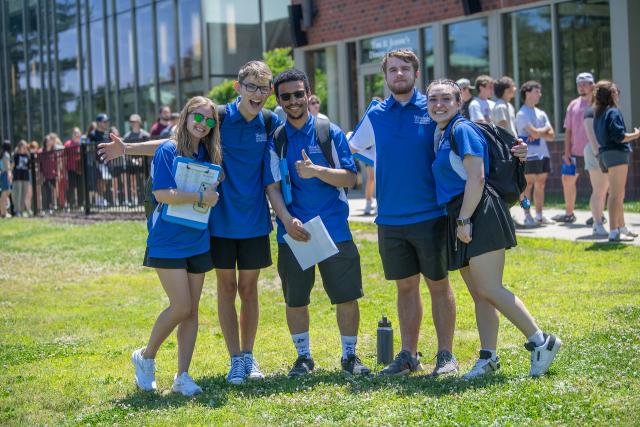 New Student Orientation student leaders smiling in a group.