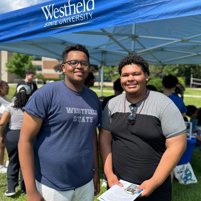 Two students smiling at New Student Orientation.